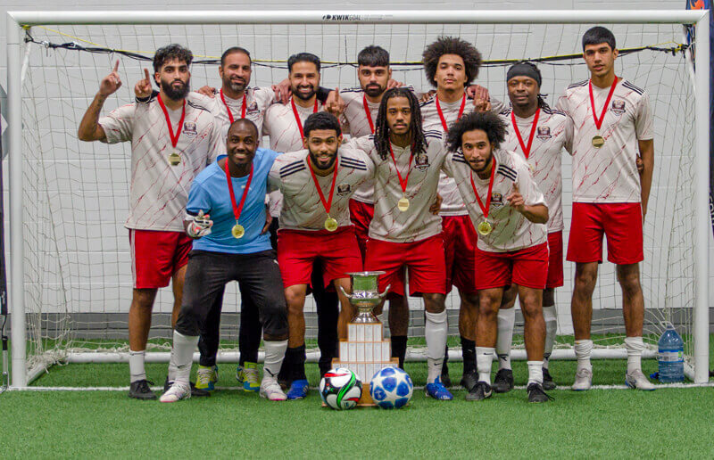 United Warriors posing after winning the BAS 2024 Indoor Soccer Championship.